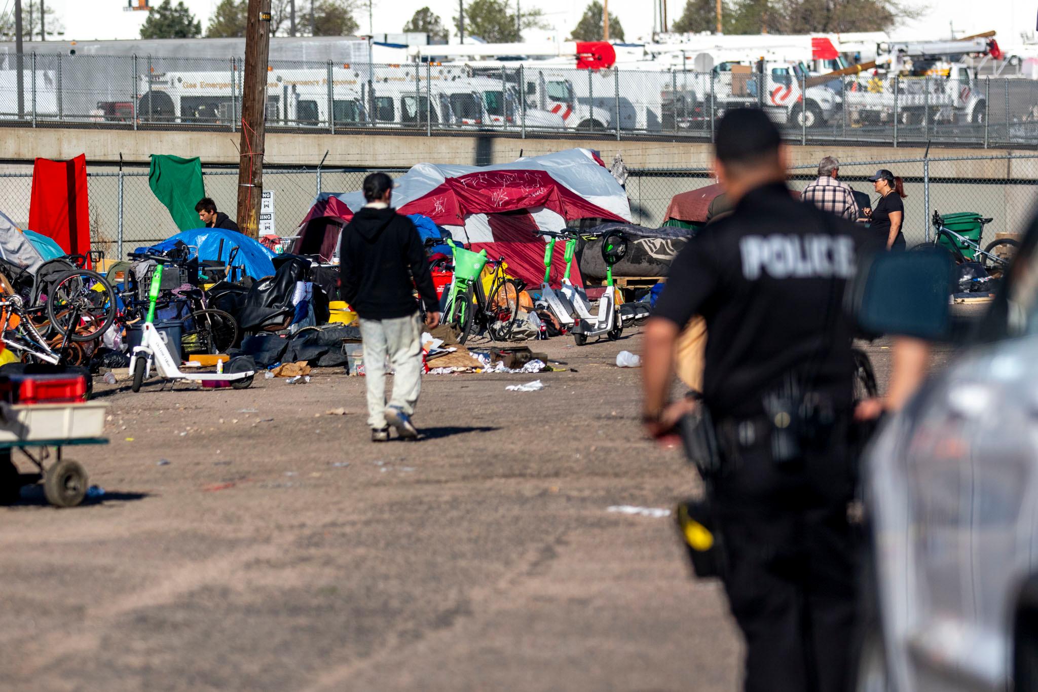 Authorities force a cleanup of an encampment
