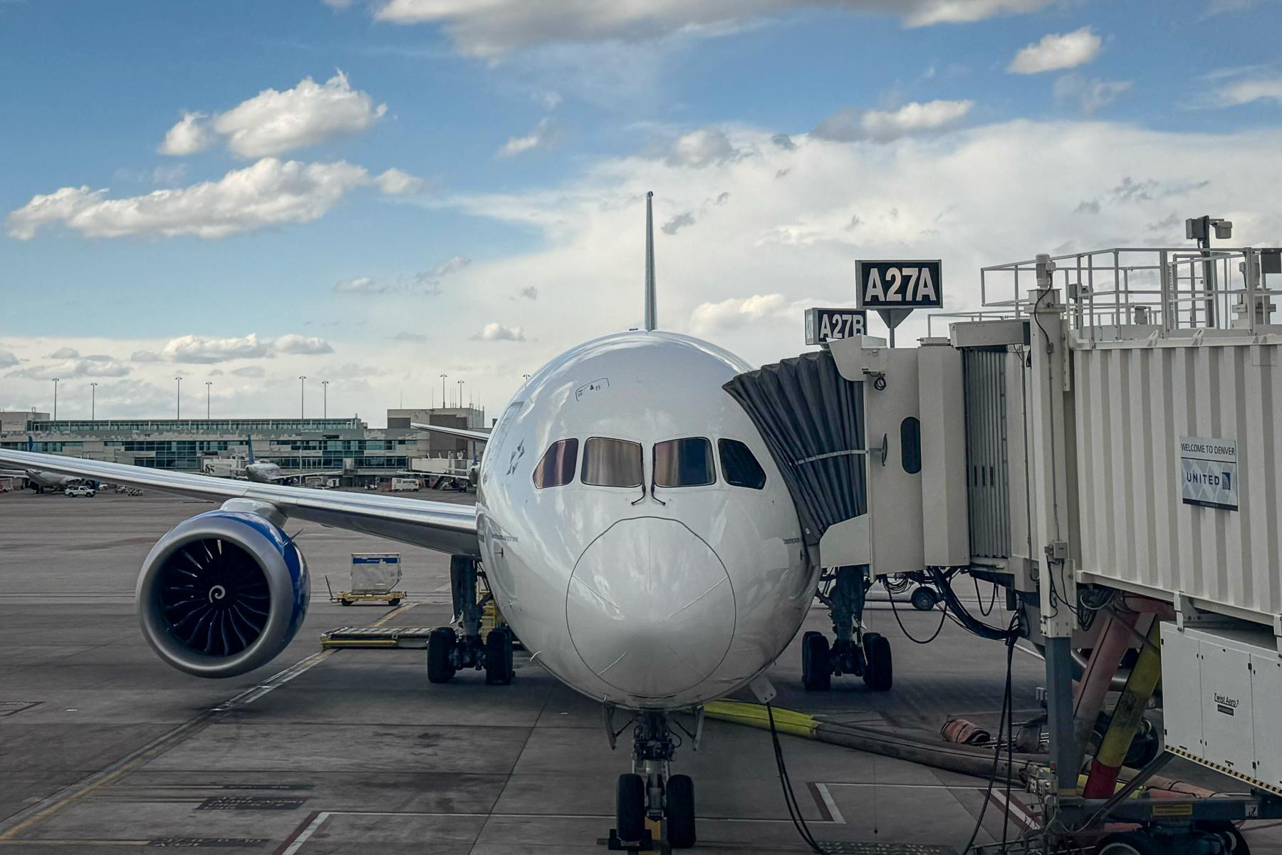 A United Airlines passenger jet parked at Denver International Airport